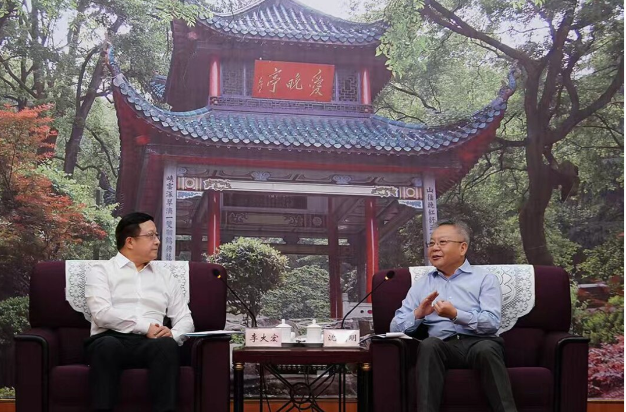 沈晓明会见海外华文媒体代表团一行
